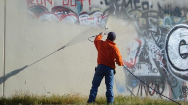 Mastering Graffiti Eradication: The How-To of Pressure Washing Techniques